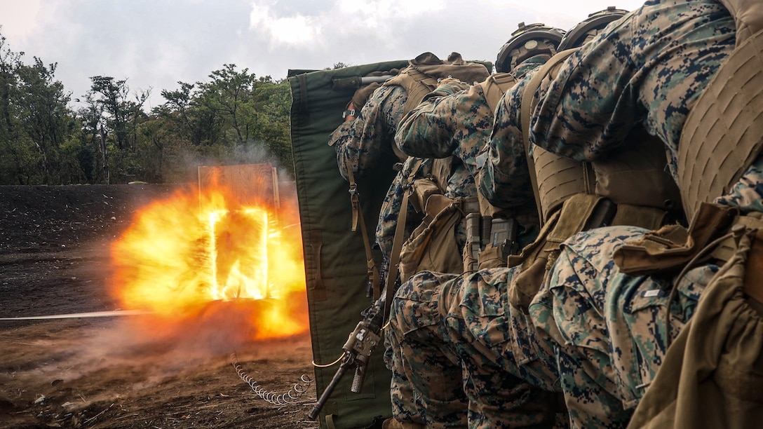 U.S. Marines with Battalion Landing Team 1st Battalion, 7th Marine Regiment, 31st Marine Expeditionary Unit, detonate a detonating cord charge during live-fire training at Combined Arms Training Center, Camp Fuji, Japan, Sept. 29, 2025. Marines conducted combined arms live-fire training to maintain operational readiness, tactical proficiency, and enhance lethality while operating within the first island chain. The 31st MEU, the Marine Corps’ only continuously forward-deployed MEU, provides a flexible and lethal force ready to perform a wide range of military operations as the premiere crisis response force in the Indo-Pacific region. (U.S. Marine Corps photo by Lance Cpl. Victor Gurrola)