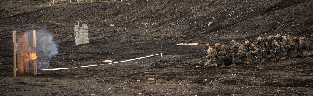 U.S. Marines with Battalion Landing Team 1st Battalion, 7th Marine Regiment, 31st Marine Expeditionary Unit, detonate a detonating cord charge on a simulated door during live-fire training at Combined Arms Training Center, Camp Fuji, Japan, Sept. 29, 2025. Marines conducted combined arms live-fire training to maintain operational readiness, tactical proficiency, and enhance lethality while operating within the first island chain. The 31st MEU, the Marine Corps’ only continuously forward-deployed MEU, provides a flexible and lethal force ready to perform a wide range of military operations as the premiere crisis response force in the Indo-Pacific region. (U.S. Marine Corps photo by Lance Cpl. Victor Gurrola)