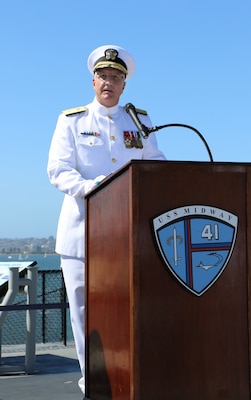 Rear Adm. Frank Brajevic, Reserve deputy director of Medical Forces Pacific, delivers remarks during his promotion ceremony aboard USS Midway on Oct. 4, 2025. In his speech, Brajevic emphasized the importance of leadership and commitment to warfighter health and readiness. (U.S. Navy Photo by Petty Officer 1st Class Nikki Smith)