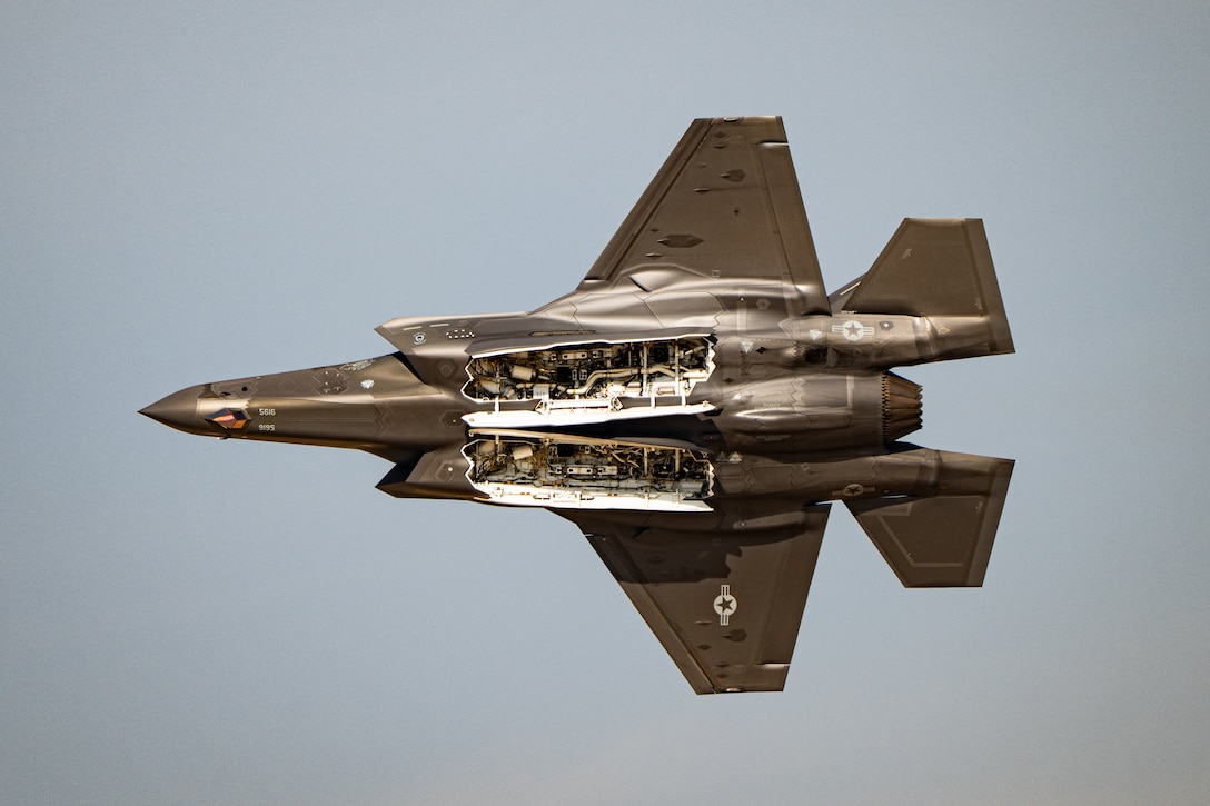 A U.S. Air Force F-35A Lightning II aircraft flown by the F-35 aerial demonstration team assigned to the 388th Fighter Wing at Hill Air Force Base, Utah, performs aerial maneuvers Nov. 15, 2025, over Al Maktoum International Airport in Dubai, United Arab Emirates. The fifth-generation stealth fighter rehearsed its performance prior to the Dubai Airshow 2025. (U.S. Air Force photo by Tech. Sgt. Justin Norton)