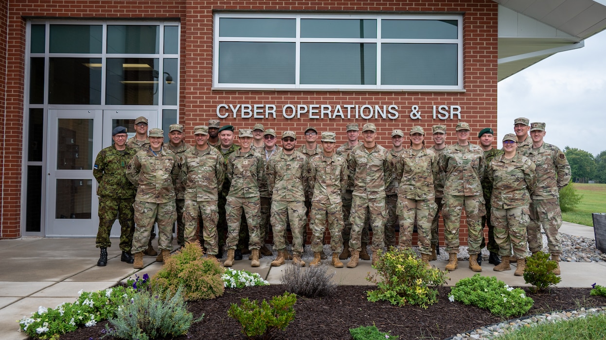 Maryland National Guard cyber operators and members of the Estonian Defence Forces pose for a group photo during Baltic Blitz 25 at Warfield Air National Guard Base at Martin State Airport, September 25, 2025. Members of the Estonian Defence Forces led the exchange by conducting workshops throughout the week focusing on tactics and capabilities related to critical thinking, as well as the collection and management of information. (U.S. Air National Guard Photo by Airman 1st Class Sarah Hoover)