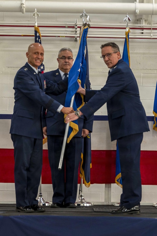 Maj. Gen. Terrence L. Koudelka, Jr., left, the Deputy Adjutant General-Air and Commander, Pennsylvania Air National Guard, presents the 171st Air Refueling Wing guidon to Col. Ryan D. Strong, incoming 171st ARW commander, during a change of command ceremony Oct. 26, 2025, near Pittsburgh, Pennsylvania. Upon taking command, Strong became the wing’s 24th commander. (U.S. Air National Guard photo by Tech. Sgt. Zoe M. Wockenfuss)