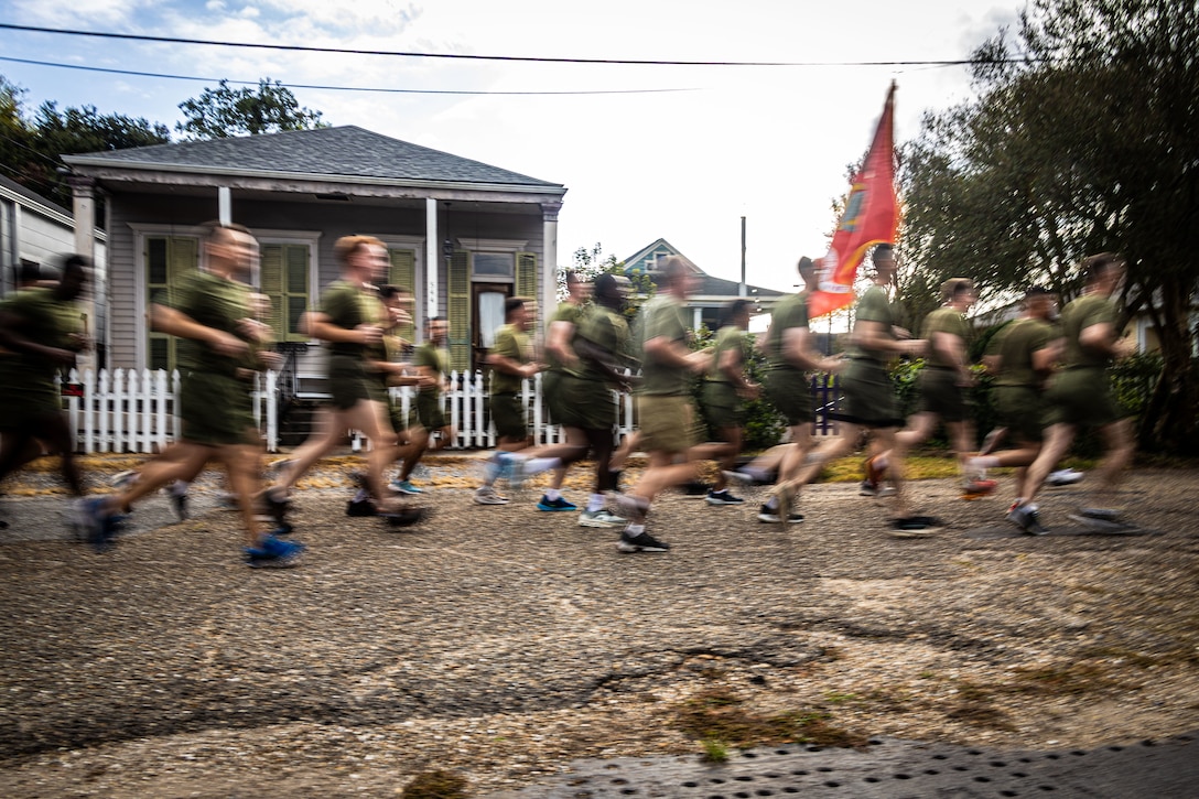 U.S. Marines and sailors with Marine Forces Reserve and Marine Forces South participate in an annual birthday motivational run celebrating the 250th birthday of the U.S. Marine Corps, in New Orleans, Nov. 7, 2025. The run started at the Marine Corps Support Facility New Orleans and traveled along the Mississippi River ending back at MCSF. The run celebrates the history of the Marine Corps and creates esprit de corps and comradery among Marines. (U.S. Marine Corps photo by Lance Cpl. Edward Spears)