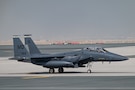 A U.S. Air Force F-15E Strike Eagle aircraft assigned to the 391st Fighter Squadron from Mountain Home Air Force Base, Idaho, taxis Nov. 15, 2025, at Al Maktoum International Airport in Dubai, United Arab Emirates, Nov. 15, 2025. The premier air-to-air and air-to-ground fighter was featured at the Dubai Airshow 2025 along with other U.S. aircraft showcasing American airpower on a global stage. (U.S. Air Force photo by Tech. Sgt. Justin Norton)