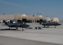 Two U.S. Air Force F-35A Lightning IIs are staged at Al Dhafra Air Base, United Arab Emirates, on Nov. 17, 2025. The aircraft will be used by the team to perform at the Dubai Airshow, showcasing the power and precision of America’s most advanced fifth-generation fighter. (U.S. Air Force photo by Staff Sgt. Nicholas Rupiper)