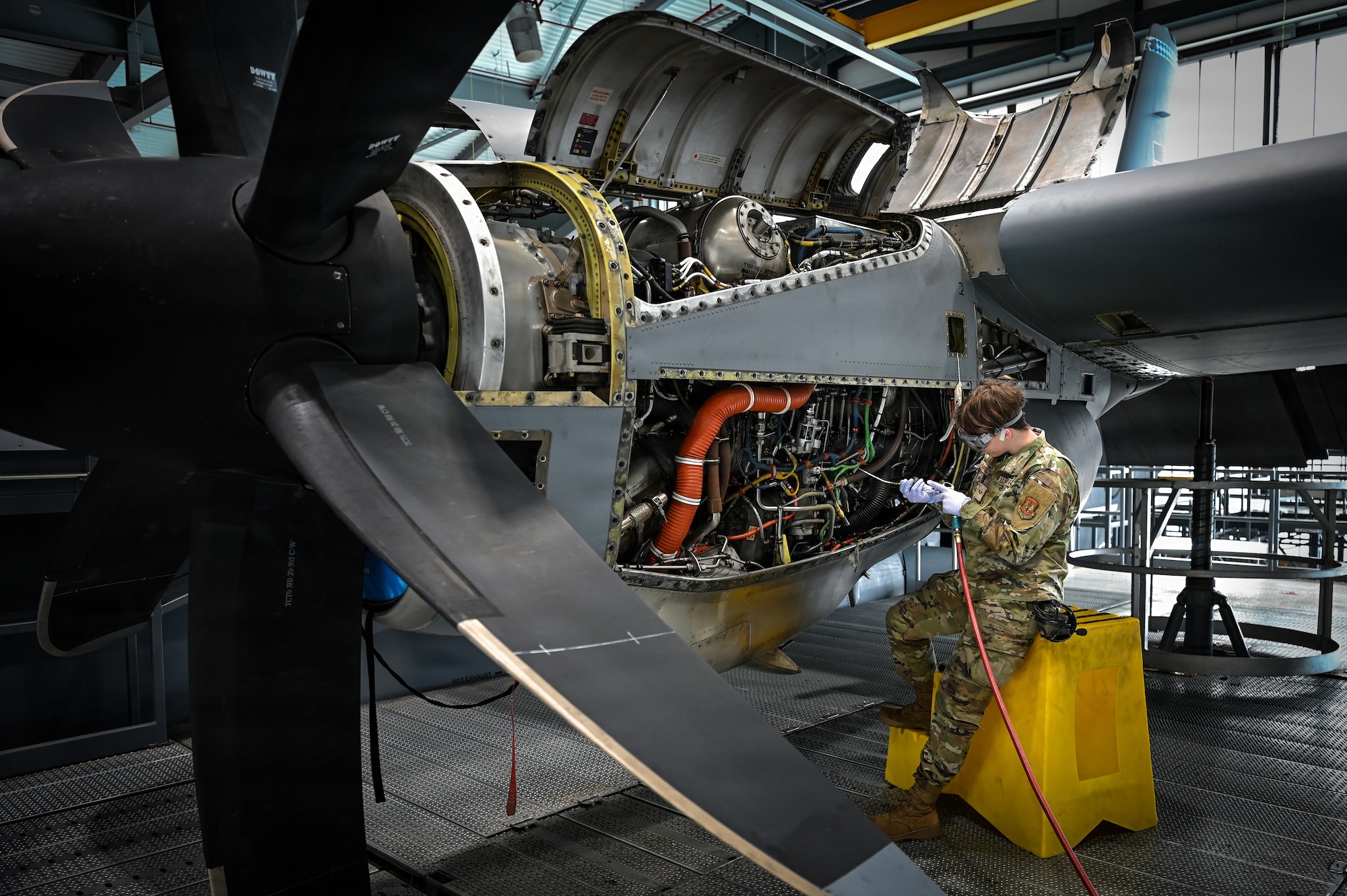 U.S. Air Force Senior Airman Heather Cummings, 86th Aircraft Maintenance Squadron aerospace inspection journeyman, conducts preventative maintenance on a C-130J Super Hercules at Ramstein Air Base, Germany, Nov. 13, 2025.