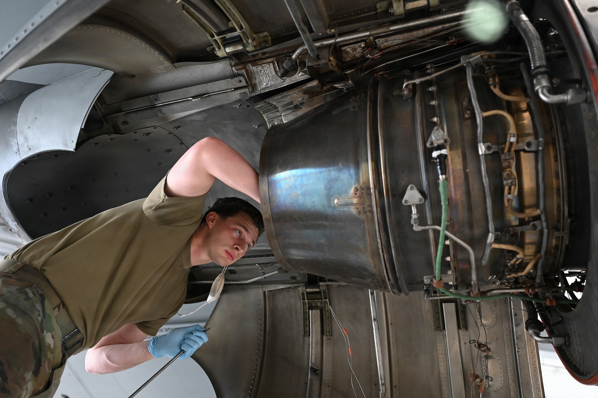 U.S. Air Force Senior Airman Matthew Ross, 86th Aircraft Maintenance Squadron aerospace inspection journeyman, installs an exhaust nozzle and turbine section tail cone on a C-130J Super Hercules at Ramstein Air Base, Germany, Nov. 13, 2025.