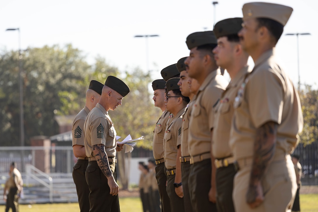 U.S. Marine Corps Sgt. Maj. Garrett Kirkby, the command senior enlisted leader of 4th Marine Division, Marine Forces Reserve, inspects Marines with Marine Forces South during a uniform inspection at Marine Corps Support Facility New Orleans, Oct. 24, 2025. The inspection was conducted to evaluate the Marines’ appearance and adherence to standards while promoting discipline and attention to detail. (U.S. Marine Corps photo by Lance Cpl. Van Hoang)