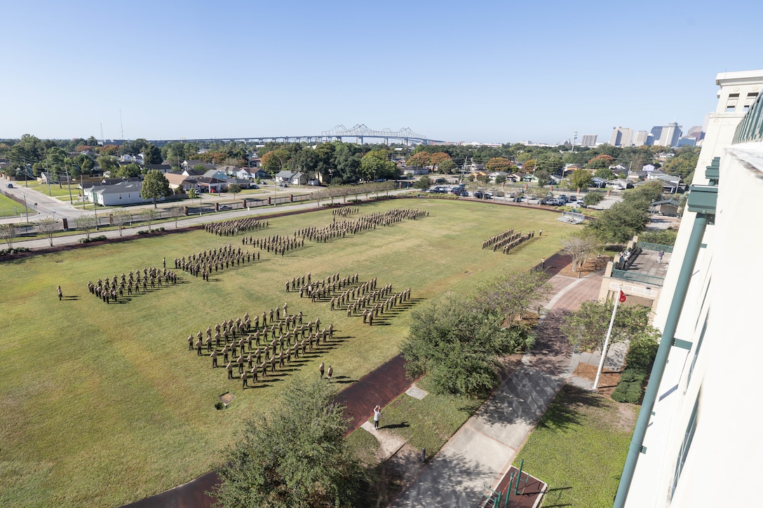 U.S. Marines with Headquarters Battalion and 4th Marine Air Wing, Marine Forces Reserve, prepare for inspection at Marine Corps Support Facility New Orleans, Oct. 24, 2025. The inspection was conducted to evaluate the Marines’ appearance and adherence to standards while promoting discipline and attention to detail. (U.S. Marine Corps photo by Lance Cpl. Van Hoang)