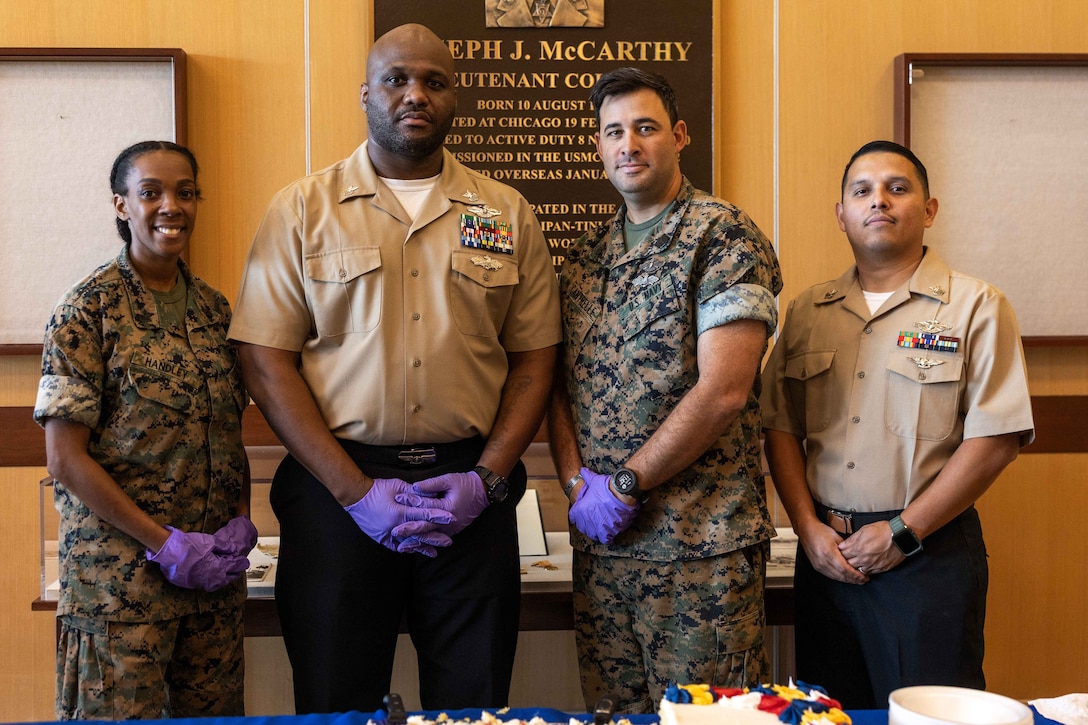 U.S. Navy Sailors pose for a photo during the Navy's 250th birthday ceremony at Marine Corps Support Facility New Orleans, Oct. 15, 2025. MARFORRES has more than 1,000 Sailors serving at more than 150 Marine Corps Reserve training centers across the nation supporting the Total Force to be ready to fight and win our nation's battles. (U.S. Marine Corps photo by Lance Cpl. Edward Spears)