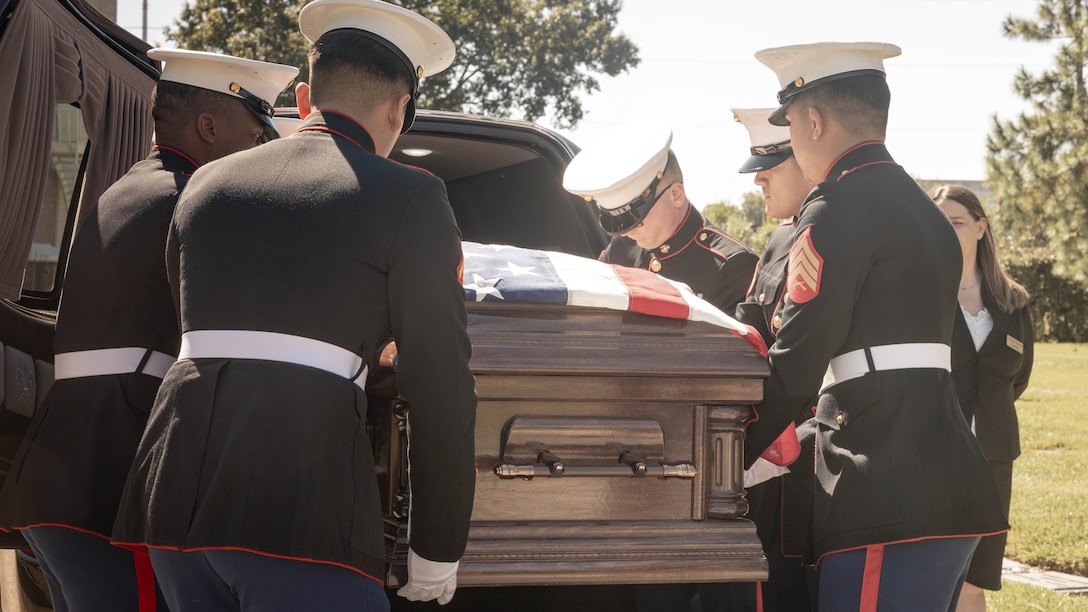 U.S. Marines with Headquarters Battalion, Marine Forces Reserve, carry the casket of Sgt. Frank Schmaltz at the Garden of Memories Funeral Home and Cemetery, Metairie, Louisiana, Oct. 13, 2025. Marine Corps Funeral Honors stands committed to ensuring that every Marine who has served receives the proper respects, serving as a final tribute to their life and a lasting demonstration of the nation's appreciation for their unwavering defense of our country, whether in times of conflict or peace. (U.S. Marine Corps photo by Lance Cpl. Van Hoang)
