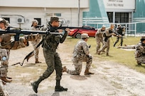 Philippine Reserve Officers' Training Corps, or ROTC, cadets conduct bounding overwatch with University of Guam ROTC cadets at the University of Guam campus, Nov. 14, 2025, under the Department of War National Guard Bureau's State Partnership Program.