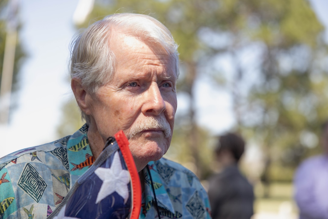 Wayne Bodker holds a U.S. flag that was draped over the casket of U.S. Marine Corps Sgt. Frank Schmaltz at the Garden of Memories Funeral Home and Cemetery, Metairie, Louisiana, Oct. 13, 2025. The flag is a tribute of lasting importance to our service members, veterans and their families. (U.S. Marine Corps photo by Lance Cpl. Van Hoang)