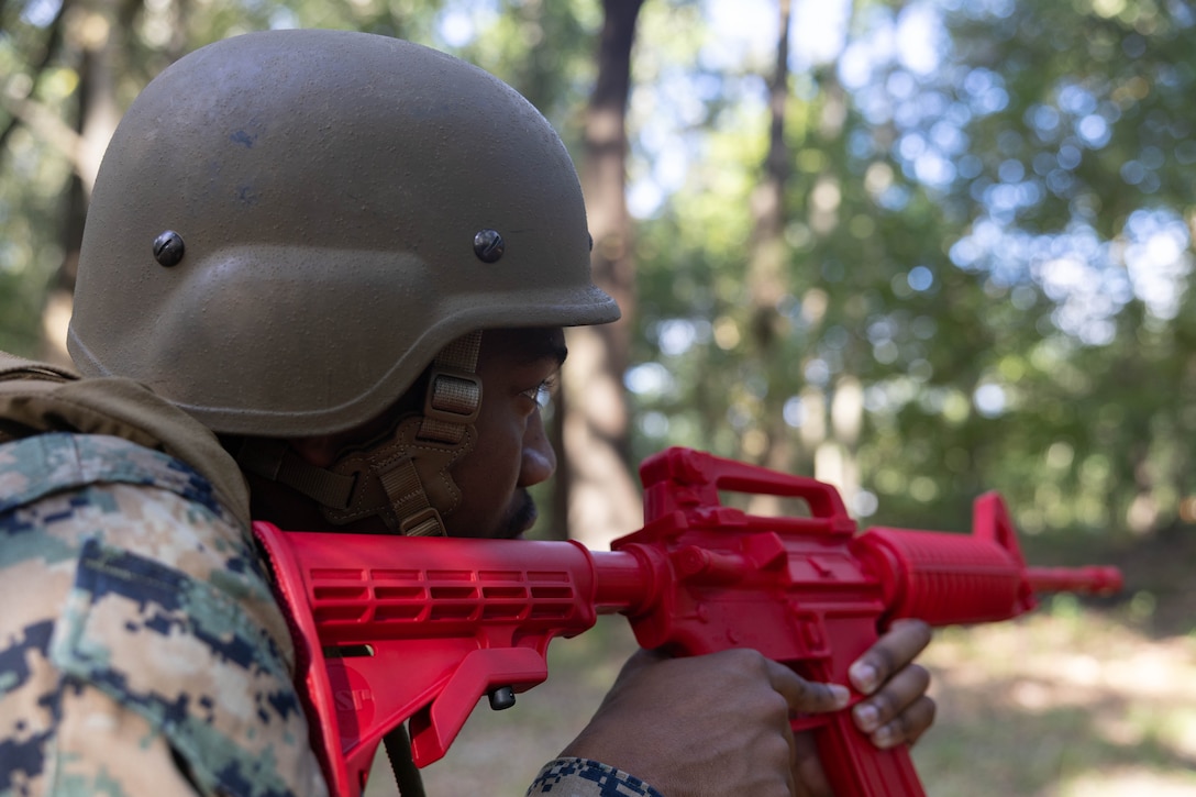 U.S. Marine Corps Cpl. Jahmir Harris, an administrative specialist with Headquarters Battalion, Marine Forces Reserve, provides security during the Corporals Course 4-25 field exercise, Naval Air Station-Joint Reserve Base New Orleans, Belle Chasse, Louisiana, Sept. 26, 2025. The field exercise tested the Marines’ leadership, decision making, and small unit tactics in a simulated environment. (U.S. Marine Corps photo by Cpl. Kanoa Thomas)