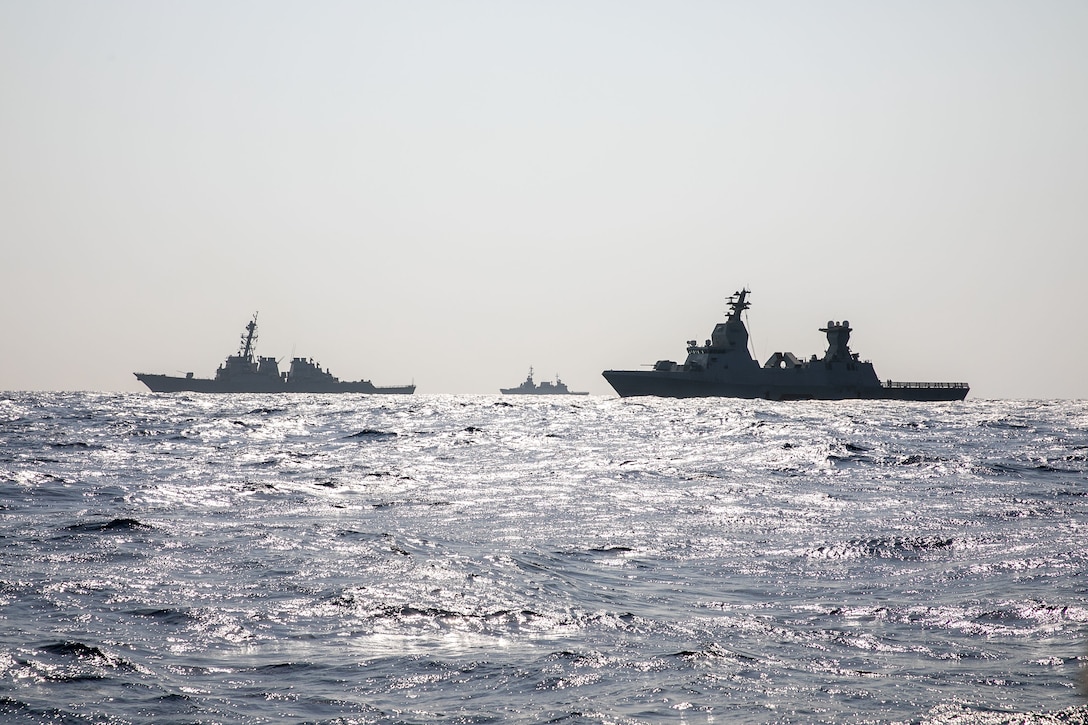 The Arleigh Burke-class guided-missile destroyer USS Mitscher (DDG 57), left, the Israel Defense Force SA’AR 6-class corvette INS Magen, center, and the Israel Defense Force SA’AR 5-class corvette INS Hanit sail in formation during a passing exercise (PASSEX) in the U.S. Central Command (CENTCOM) area of responsibility, Nov. 13, 2025. Mitscher is deployed to the U.S. 5th Fleet area of operations to support maritime security and stability in the CENTCOM area of responsibility.