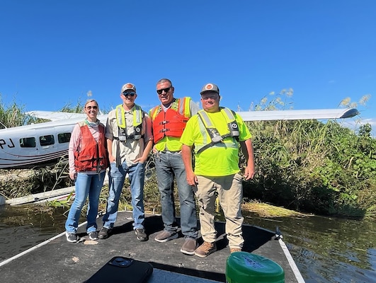With exceptional teamwork and adaptability, this group of Jacksonville District employees, Jessica “Skippy” Martin, Lee Martin, Graham Thompson and Steven Klemme, pictured at the crash site, transformed a routine workday into a life-saving response. Swift action and seamless coordination ensured passengers reached medical care and first responders safely and quickly.