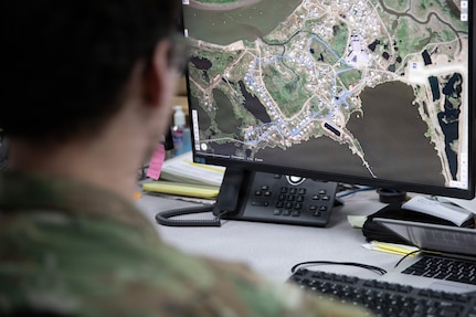 Tech. Sgt. Wolf Russo, Common Operating Picture manager with the Alaska National Guard’s Joint Force Headquarters, demonstrates capabilities of Maven in response to Western Alaska storms at Joint Base-Elmendorf Richardson, Alaska, Nov. 10, 2025.