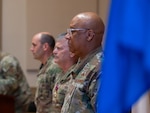 U.S. Air Force Command Chief Master Sgt. Anthony D. Sims, right, stands at attention during a ceremony in which assumes the position of District of Columbia Air National Guard Command Chief Master Sgt. at the D.C. Armory in Washington, Nov. 9, 2025. The Command Chief Master Sgt. is the principal military advisor to the commanding general on all matters concerning the Air National Guard enlisted force. (U.S. Air National Guard photo by Tech. Sgt. Andrew Enriquez)