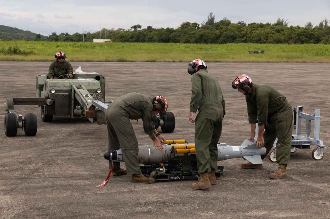 U.S. Marines with Marine Fighter Attack Squadron (VMFA) 225, U.S. Marine Corps Forces, South, prepare to load a GBU-54 Laser Joint Direct Attack Munition onto a munitions loader at Jose Aponte de la Torre Airport, Puerto Rico, Oct. 16, 2025. U.S. military forces are deployed to the Caribbean in support of the U.S. Southern Command mission, Department of War-directed operations, and the president’s priorities to disrupt illicit drug trafficking and protect the homeland. (U.S. Marine Corps photo by Lance Cpl. Michael Gavin)