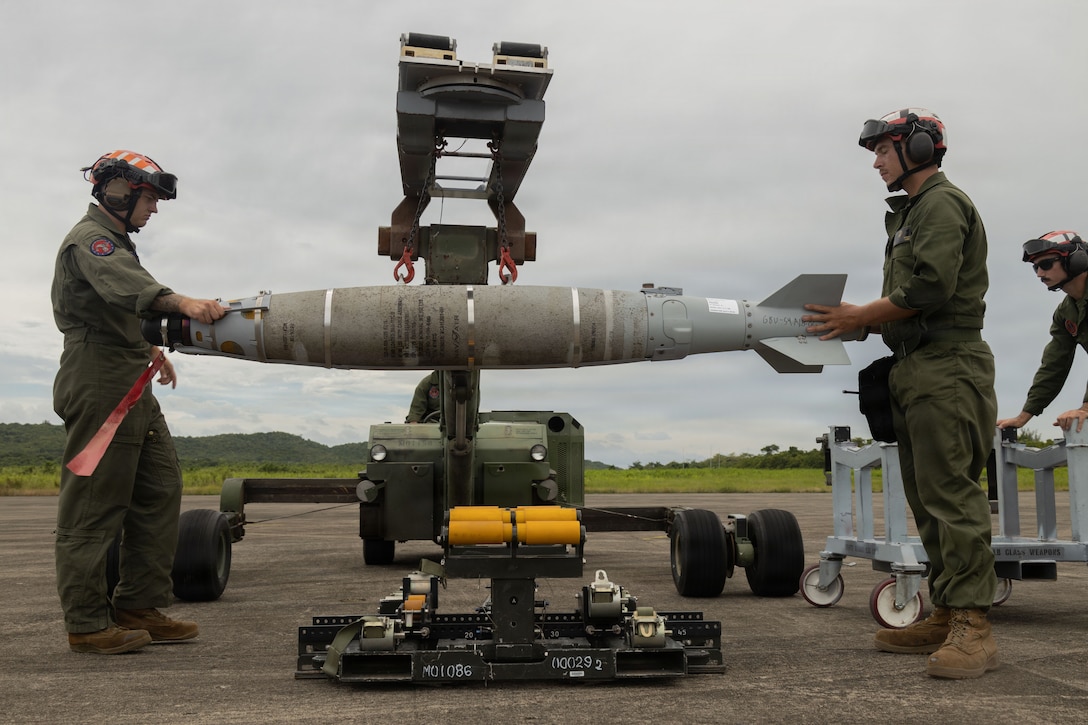 U.S. Marines with Marine Fighter Attack Squadron (VMFA) 225, U.S. Marine Corps Forces, South, load a GBU-54 Laser Joint Direct Attack Munition onto a munitions loader at Jose Aponte de la Torre Airport, Puerto Rico, Oct. 16, 2025. U.S. military forces are deployed to the Caribbean in support of the U.S. Southern Command mission, Department of War-directed operations, and the president’s priorities to disrupt illicit drug trafficking and protect the homeland. (U.S. Marine Corps photo by Lance Cpl. Michael Gavin)