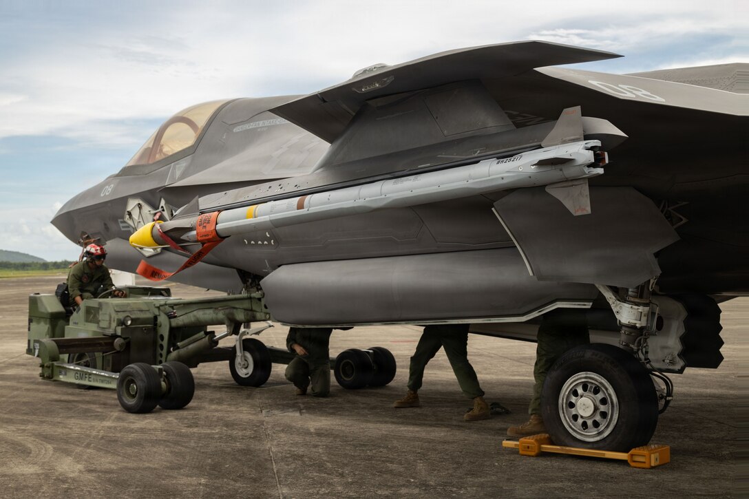 U.S. Marines with Marine Fighter Attack Squadron (VMFA) 225, U.S. Marine Corps Forces, South, load a GBU-54 Laser Joint Direct Attack Munition into a U.S. Marine Corps F-35B Lightning II assigned to VMFA-225 at Jose Aponte de la Torre Airport, Puerto Rico, Oct. 16, 2025. U.S. military forces are deployed to the Caribbean in support of the U.S. Southern Command mission, Department of War-directed operations, and the president’s priorities to disrupt illicit drug trafficking and protect the homeland. (U.S. Marine Corps photo by Lance Cpl. Michael Gavin)