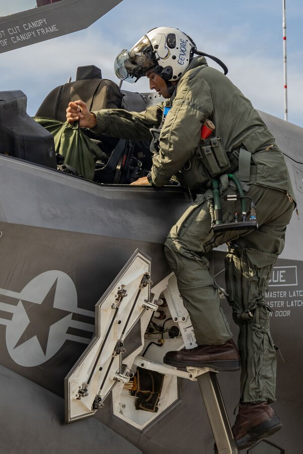 A U.S. Marine Corps pilot climbs into the cockpit of a F-35B Lightning II assigned to Marine Fighter Attack Squadron (VMFA) 225, U.S. Marine Corps Forces, South, at Jose Aponte de la Torre Airport, Puerto Rico, Oct. 17, 2025. U.S. military forces are deployed to the Caribbean in support of the U.S. Southern Command mission, Department of War-directed operations, and the president’s priorities to disrupt illicit drug trafficking and protect the homeland. (U.S. Marine Corps photo by Lance Cpl. Michael Gavin)