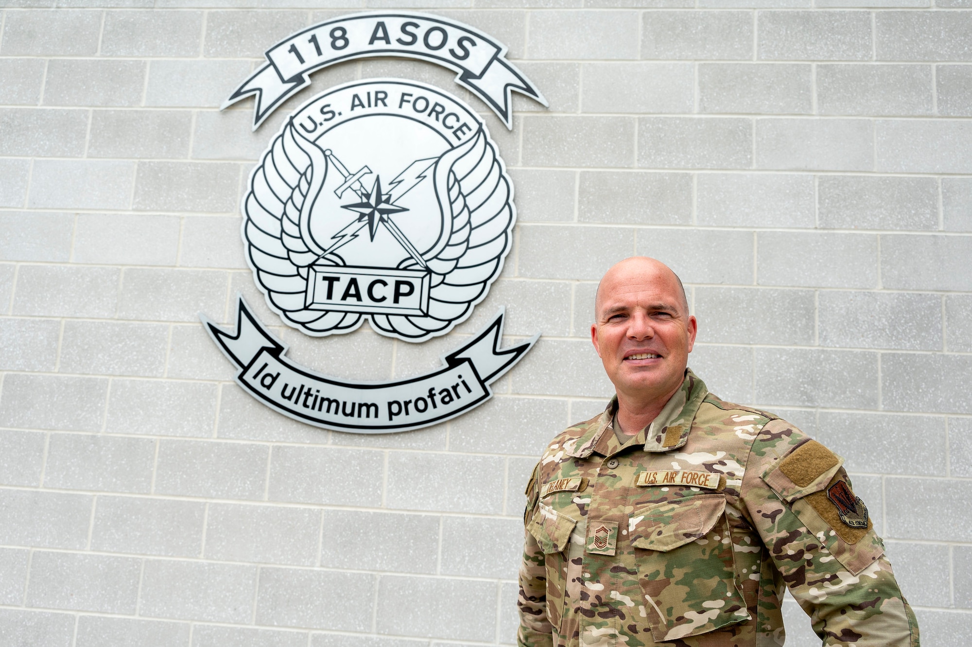 U.S. Air Force Senior Master Sgt. Tavis J. Delaney, 118th Air Support Operations Squadron (118 ASOS) Tactical Air Control Party (TACP) superintendent, poses for a photo outside of the 118 ASOS building at the New London Air National Guard base, N.C., August 1, 2025.