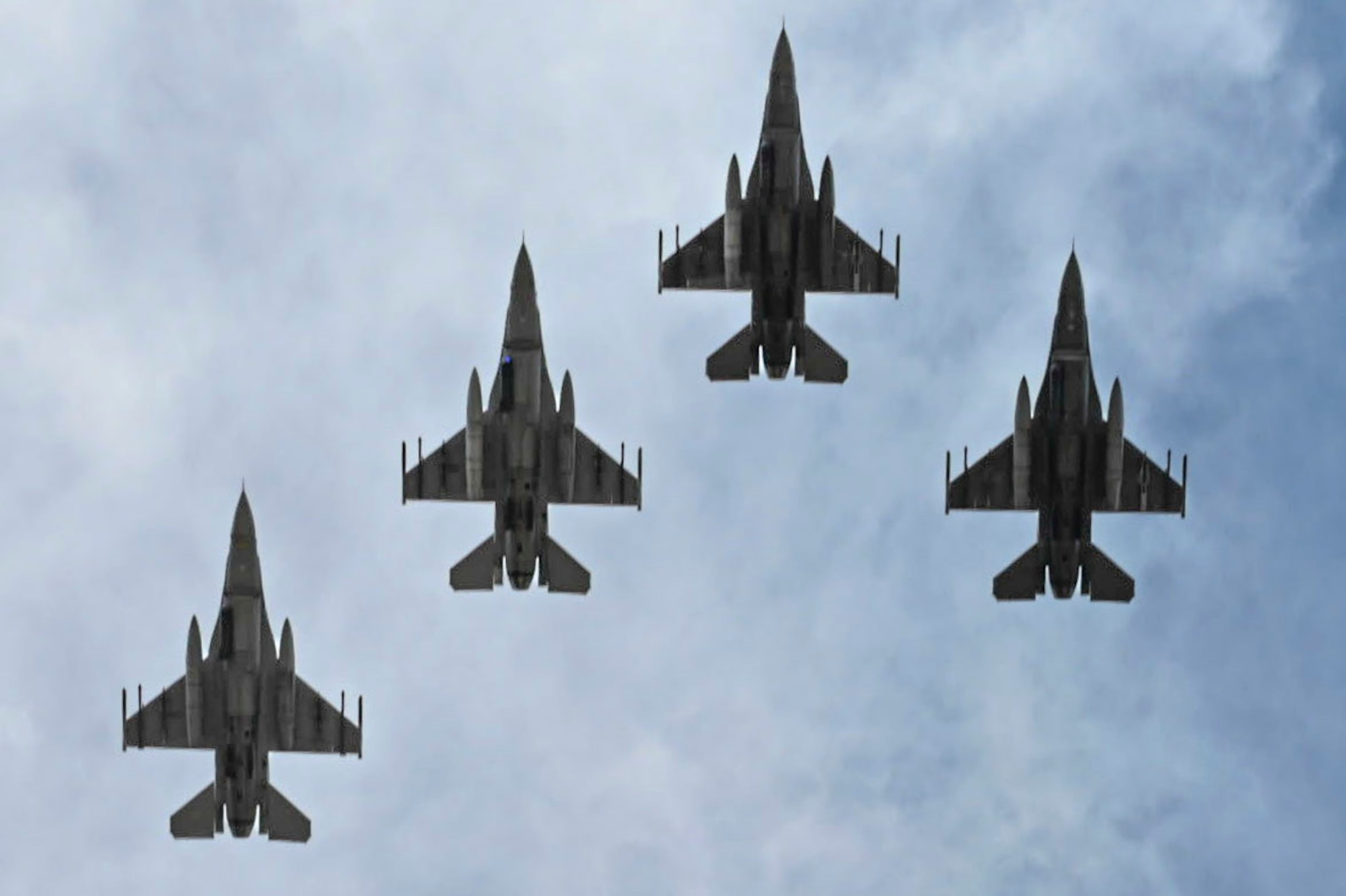 The Red Eyes of the 120th Fighter Squadron, 140th Wing, Colorado Air National Guard perform a flyover with four F-16 Fighting Falcon aircraft for the opening of Cheyenne Frontier Days, Cheyenne, Wyoming, July 19, 2025.