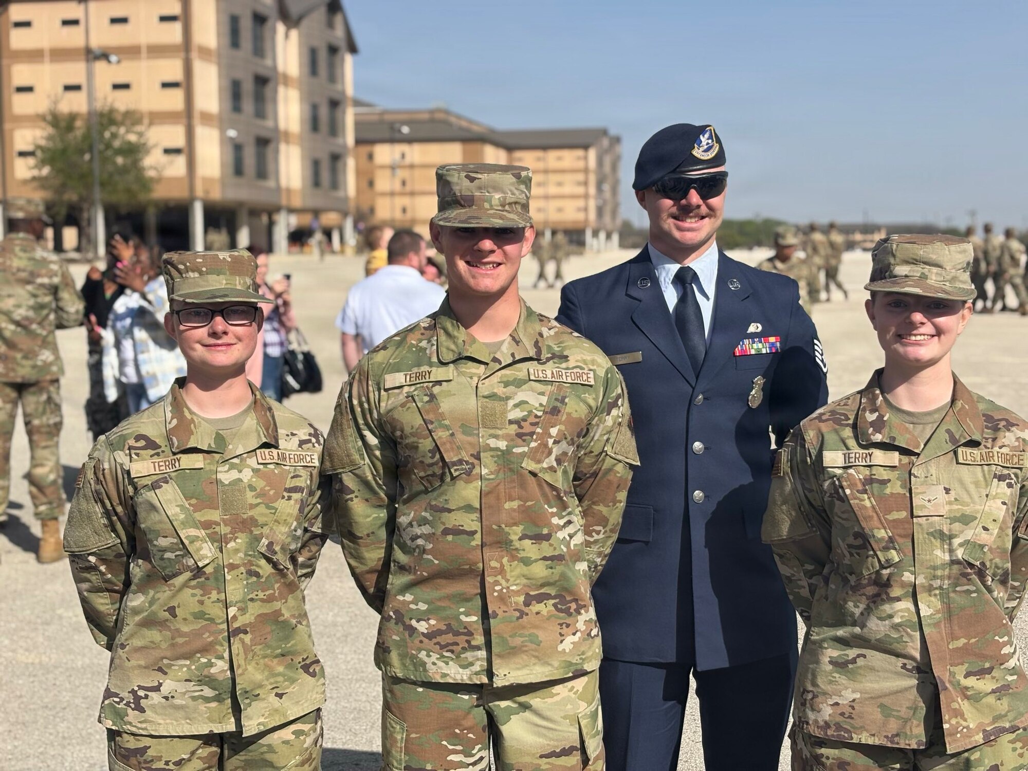 U.S. Air Force Staff Sgt. Ryan Terry stands with his siblings, from left, Airman Basic Morgan Terry, Airman Basic Kael Terry, and Airman Rachel Terry following Basic Military Training graduation at Joint Base San Antonio-Lackland, Texas, March 20, 2025.