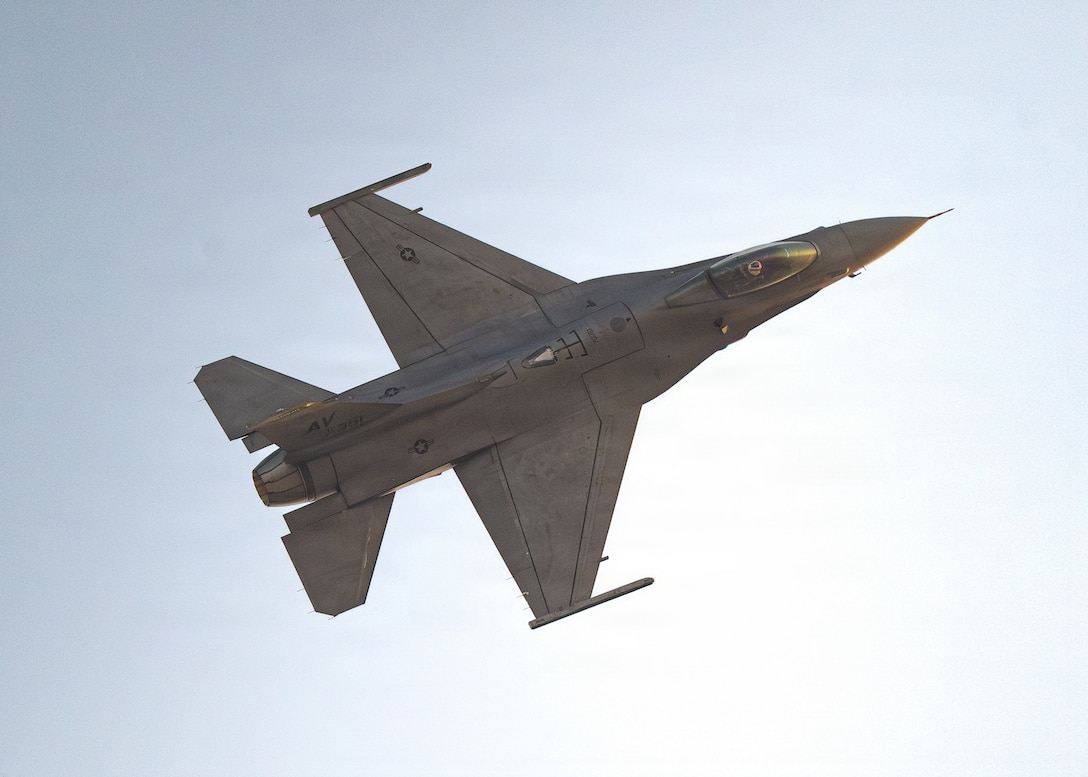 U.S. Air Force Maj. Taylor “FEMA” Hiester, F-16 Viper Demonstration Team commander and pilot, performs aerial maneuvers in a U.S. Air Force F-16C Fighting Falcon assigned to the 31st Fighter Wing at Aviano Air Base, Italy, during an airshow at Dubai, United Arab Emirates, Nov. 13, 2025. The F-16, a multi-role fighter aircraft capable of both air-to-air and air-to-ground combat, demonstrates its versatility through dynamic aerial demonstrations across the U.S. and abroad. (U.S. Air Force photo by Staff Sgt. Steven Cardo)