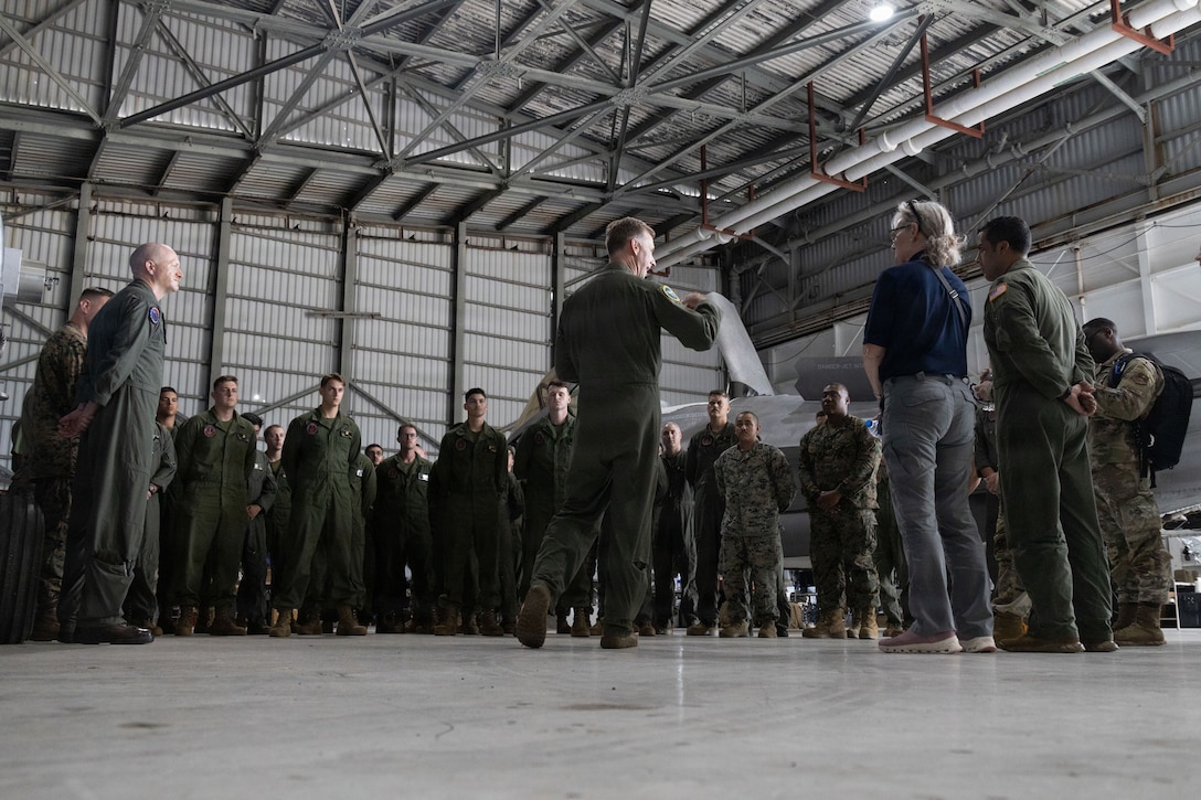U.S. Air Force Maj. Gen. David A. Mineau, center, commander, Air Forces Southern, speaks to U.S. Marines with Marine Fighter Attack Squadron (VMFA) 225, U.S. Marine Corps Forces, South, at Jose Aponte de la Torre Airport in Ceiba, Puerto Rico, Oct. 29, 2025. U.S. military forces are deployed to the Caribbean in support of the U.S. Southern Command mission, Department of War-directed operations, and the president’s priorities to disrupt illicit drug trafficking and protect the homeland. (U.S. Marine Corps photo)