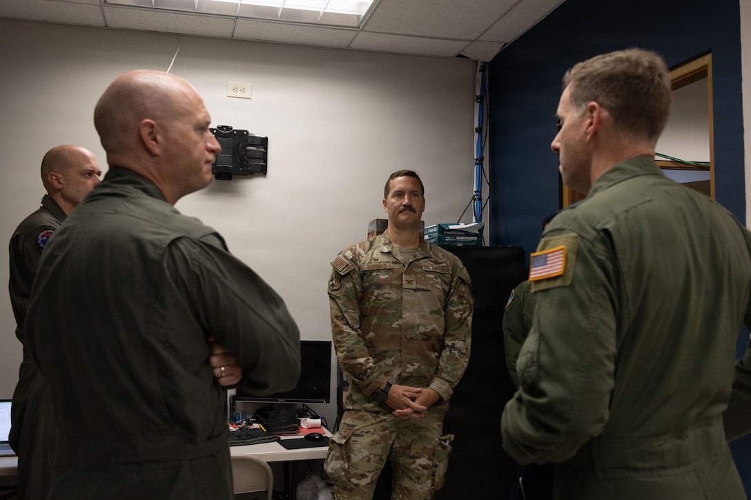 U.S. Air Force Maj. Gen. David A. Mineau, right, commander, Air Forces Southern, U.S. Air Force Col. Benjamin, center, the 346th Air Expeditionary Wing commander, speak to the commanding and executive officer of Marine Fighter Attack Squadron (VMFA) 225, U.S. Marine Corps Forces, South, left, at Jose Aponte de la Torre Airport in Ceiba, Puerto Rico, Oct. 29, 2025. U.S. military forces are deployed to the Caribbean in support of the U.S. Southern Command mission, Department of War-directed operations, and the president’s priorities to disrupt illicit drug trafficking and protect the homeland. (U.S. Marine Corps photo)