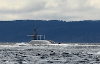 POULSBO, Wash. – The Ohio-class ballistic missile submarine USS Pennsylvania (SSBN 735) returns to its home port at Naval Base Kitsap after completing a strategic deterrent patrol in 2015. The U.S. Navy is consistently deployed to maintain peace, protect commerce and deter aggression through its forward presence. Dan Hogan served aboard Pennsylvania from 2001 to 2004. (Photo by Kenneth G. Takada, Mass Communication Specialist 1st Class/U.S. Navy)