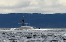 POULSBO, Wash. – The Ohio-class ballistic missile submarine USS Pennsylvania (SSBN 735) returns to its home port at Naval Base Kitsap after completing a strategic deterrent patrol in 2015. The U.S. Navy is consistently deployed to maintain peace, protect commerce and deter aggression through its forward presence. Dan Hogan served aboard Pennsylvania from 2001 to 2004. (Photo by Kenneth G. Takada, Mass Communication Specialist 1st Class/U.S. Navy)