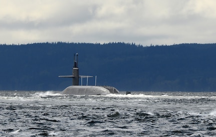 POULSBO, Wash. – The Ohio-class ballistic missile submarine USS Pennsylvania (SSBN 735) returns to its home port at Naval Base Kitsap after completing a strategic deterrent patrol in 2015. The U.S. Navy is consistently deployed to maintain peace, protect commerce and deter aggression through its forward presence. Dan Hogan served aboard Pennsylvania from 2001 to 2004. (Photo by Kenneth G. Takada, Mass Communication Specialist 1st Class/U.S. Navy)