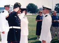 PENSACOLA, Fla. – Dan Hogan’s first salute marks the start of his commitment to service and leadership. After two decades in the Navy, Hogan now helps develop and enhance software that keeps the Navy’s submarines mission ready. (Dan Hogan/Courtesy Photo)