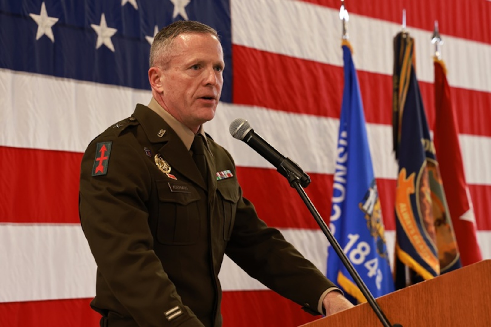 U.S. Army Brig. Gen. Brion Aderman, Wisconsin’s deputy adjutant general for Army, addresses attendees of the 2025 Wisconsin Army National Guard Hall of Honor ceremony at the Department of Military Affairs facility in Madison, Wisconsin, Nov. 1, 2025. The Hall of Honor program was established in 2000 to recognize Wisconsin National Guard Soldiers who have distinguished themselves through exceptional achievement and devotion to duty, significantly contributing to the enduring legacy of the organization. (U.S. National Guard photo by Paul Gorman)