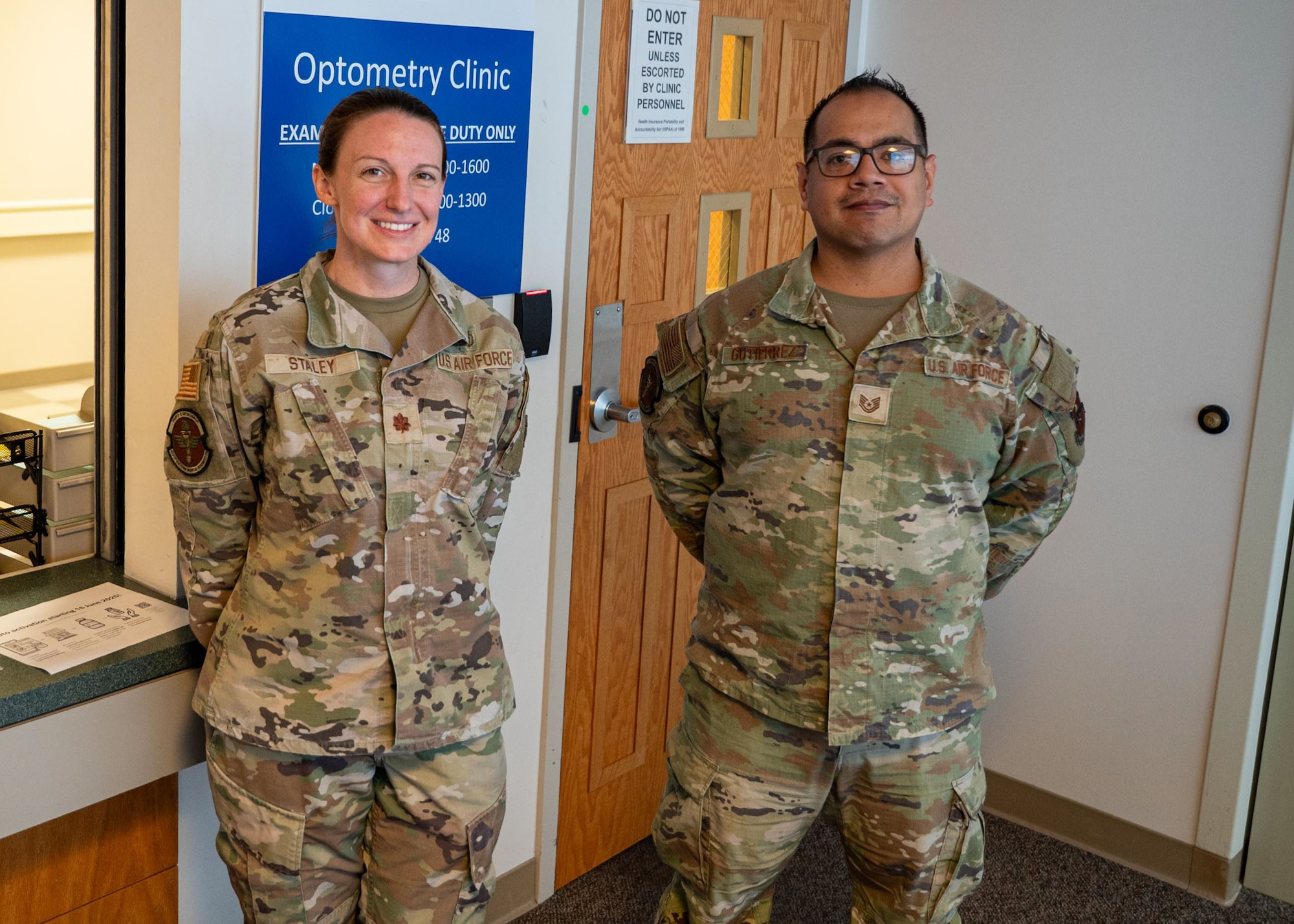 U.S. Air Force Maj. Katelin Staley, 42d Medical Group physical medicine optometry flight commander, and Tech. Sgt. Gabino Gutierrez, 42d MDG human performance flight chief pose for a photo at Maxwell Air Force Base, Alabama, Nov. 5, 2025.