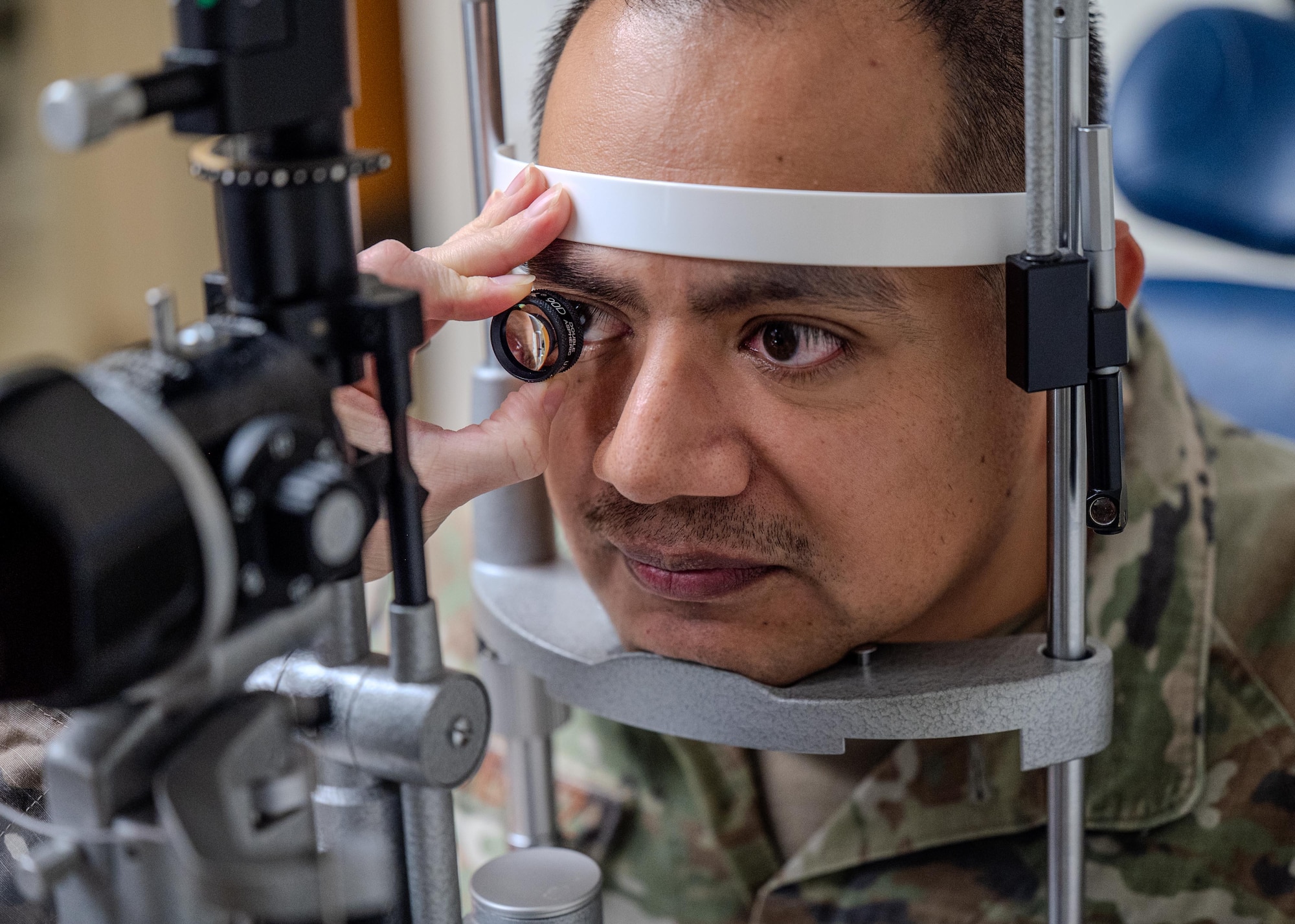 U.S Air Force Maj. Katelin Staley, 42d Medical Group human physical medicine optometry flight commander, performs an eye test check on Tech. Sgt. Gabino Gutierrez, 42d MDG performance flight chief, at Maxwell Air Force Base, Alabama, Nov. 5, 2025.