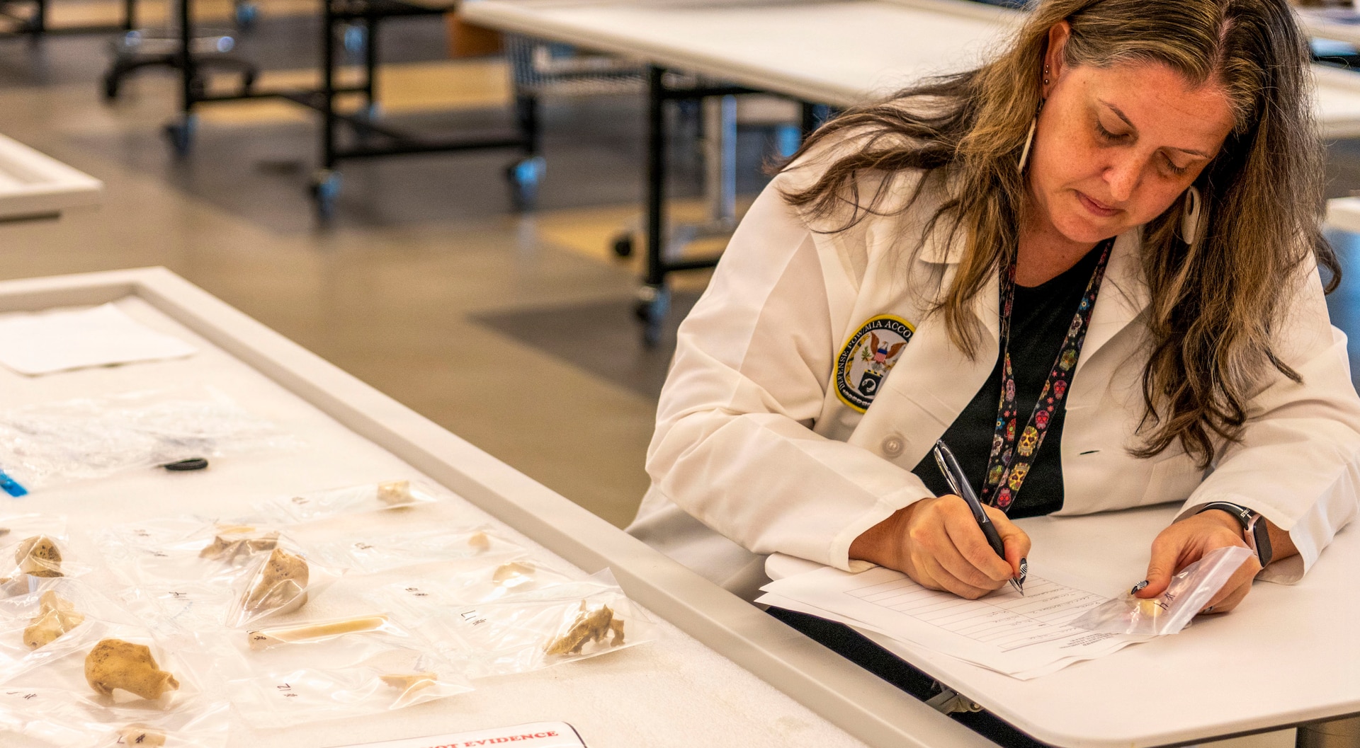 Dr. Rebecca Taylor, a Defense POW/MIA Accounting Agency forensic anthropologist supervisor, takes a lab proficiency test at the Daniel K. Inouye DPAA Center of Excellence, Joint Base Pearl Harbor-Hickam, Hawaii, Oct. 30, 2025.
