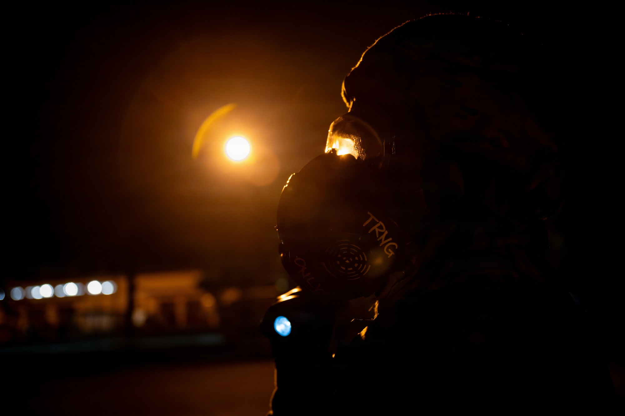 A U.S. Airman assigned to the 35th Logistics Readiness Squadron conducts a Post Attack Reconnaissance sweep after a simulated missile attack during exercise Beverly Sunrise 26-1 at Misawa Air Base, Japan, Oct. 16, 2025.