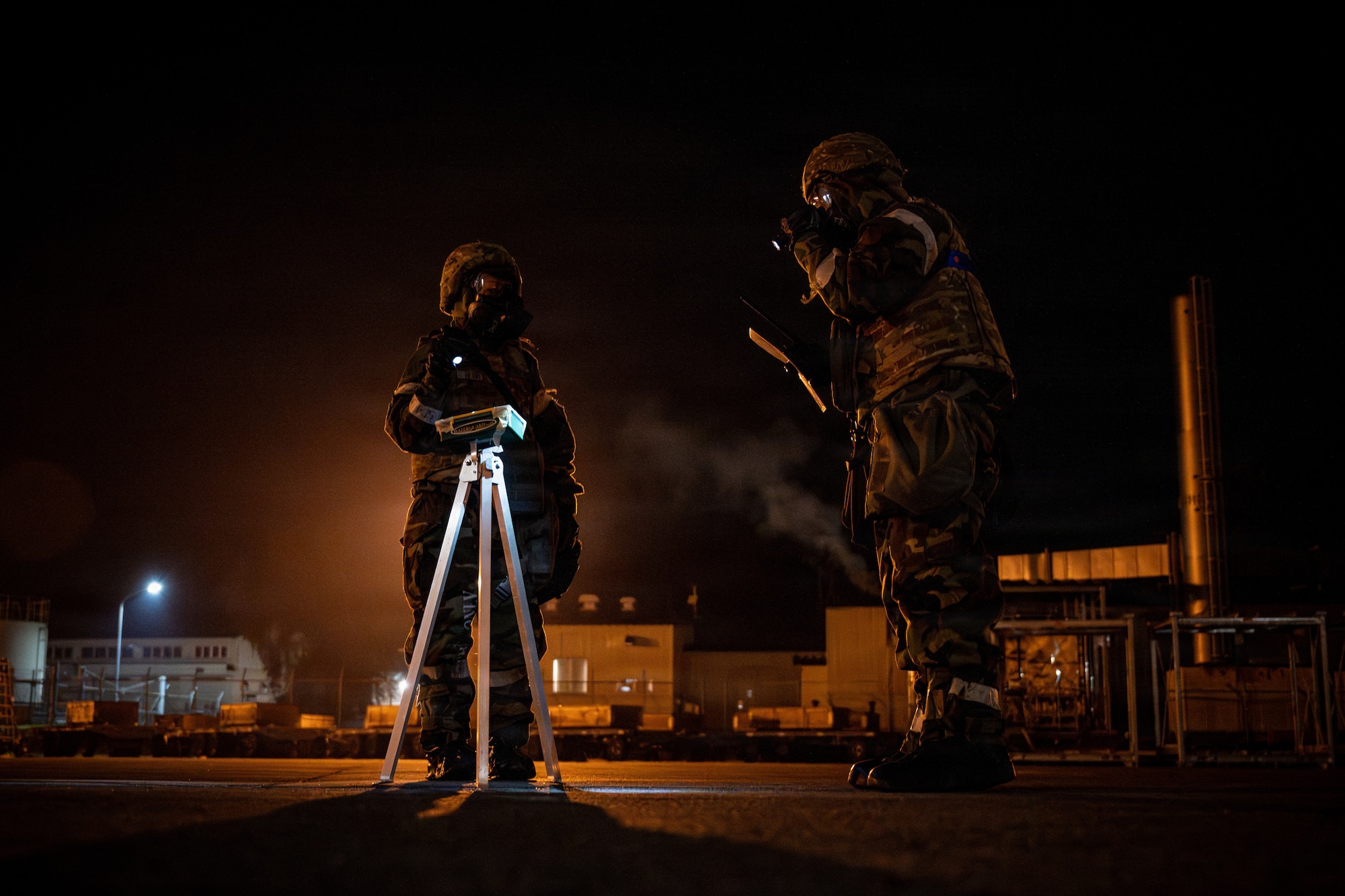 U.S. Airmen assigned to the 35th Logistics Readiness Squadron conduct a Post Attack Reconnaissance sweep after a simulated missile attack during Exercise Beverly Sunrise 26-1 at Misawa Air Base, Japan, Oct. 16, 2025.