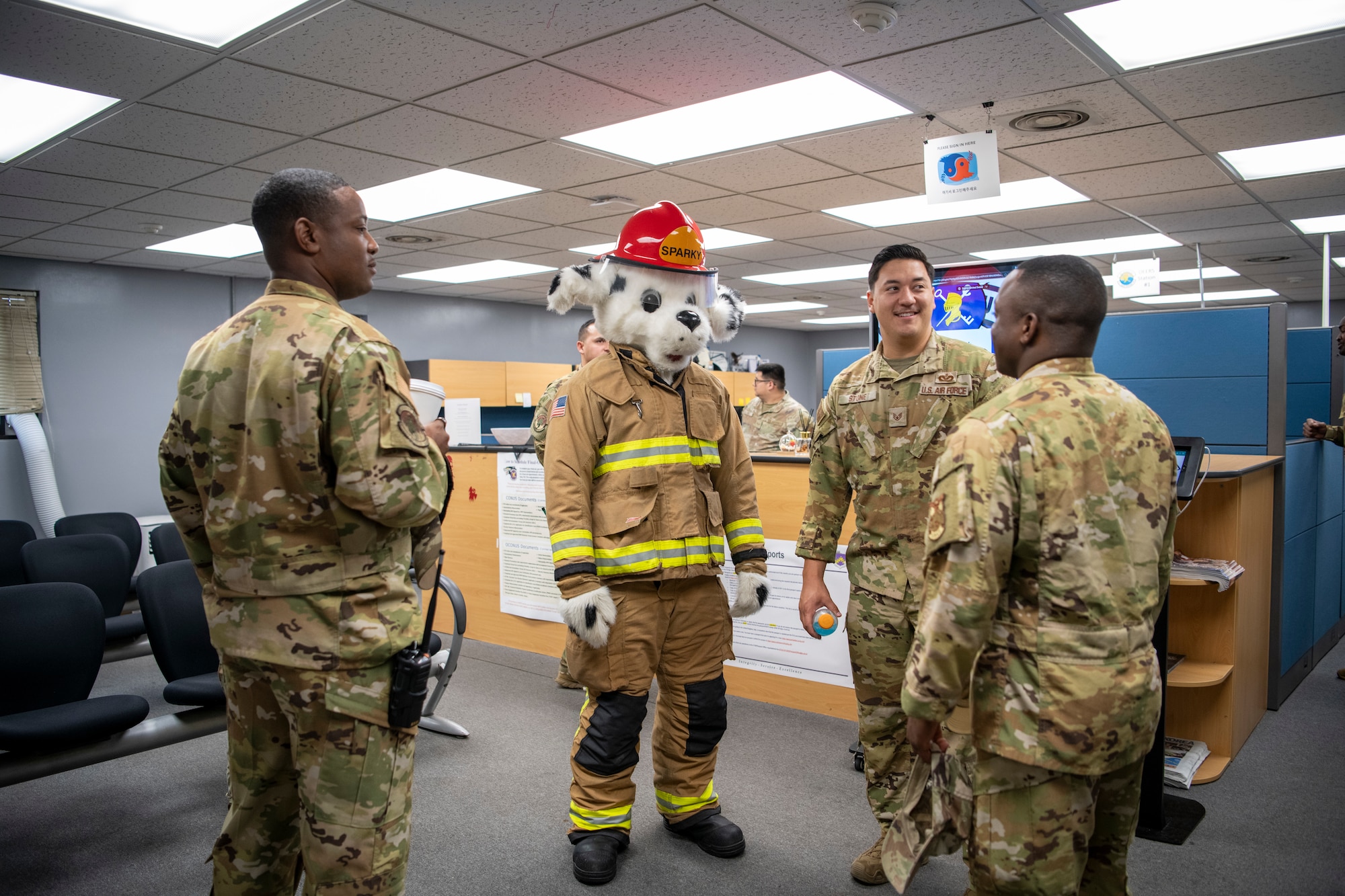 A mascot greets people.