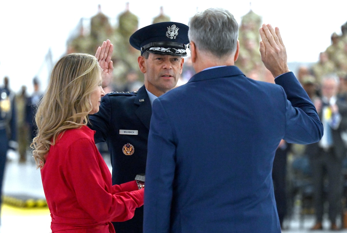 Secretary of the Air Force Troy Meink  presides over the ceremony of Air Force Chief of Staff Gen. Ken Wilsbach during his assumption of responsibility ceremony at Joint Base Andrews, Md. Nov. 18, 2025. During the ceremony, Gen. Wilsbach was sworn in as the 24th Chief of Staff of the Air Force. (U.S. Air Force photo by Chad Trujillo)