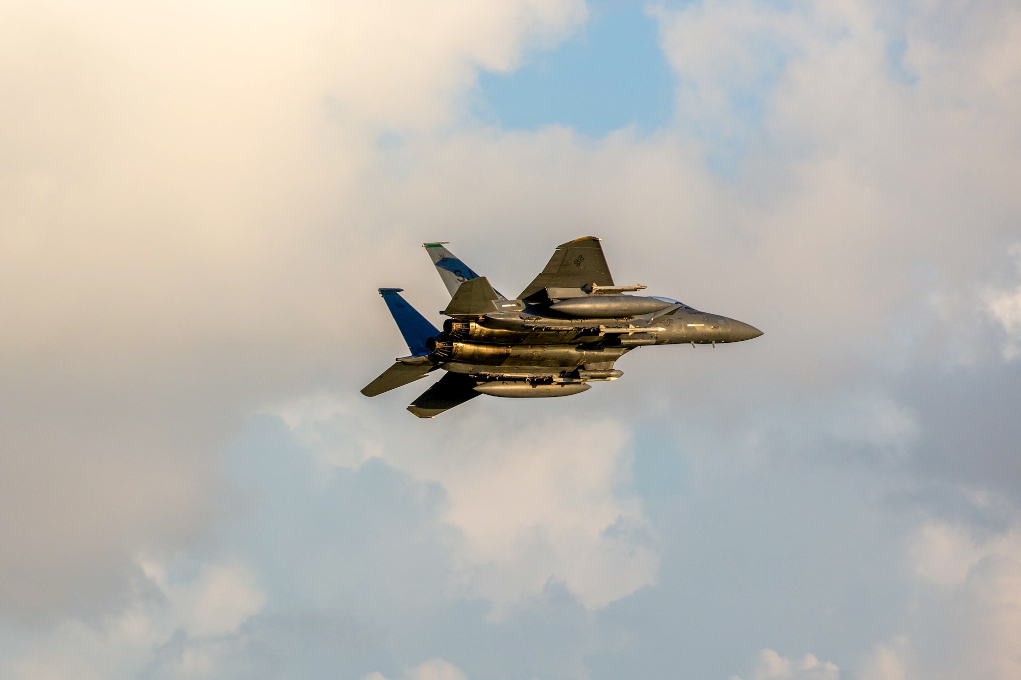 A U.S. Air Force F-15E Strike Eagle, assigned to the 336th Expeditionary Fighter Squadron, deployed to Kadena Air Base, prepares to land at Kadena AB, Japan, Aug. 4, 2025.