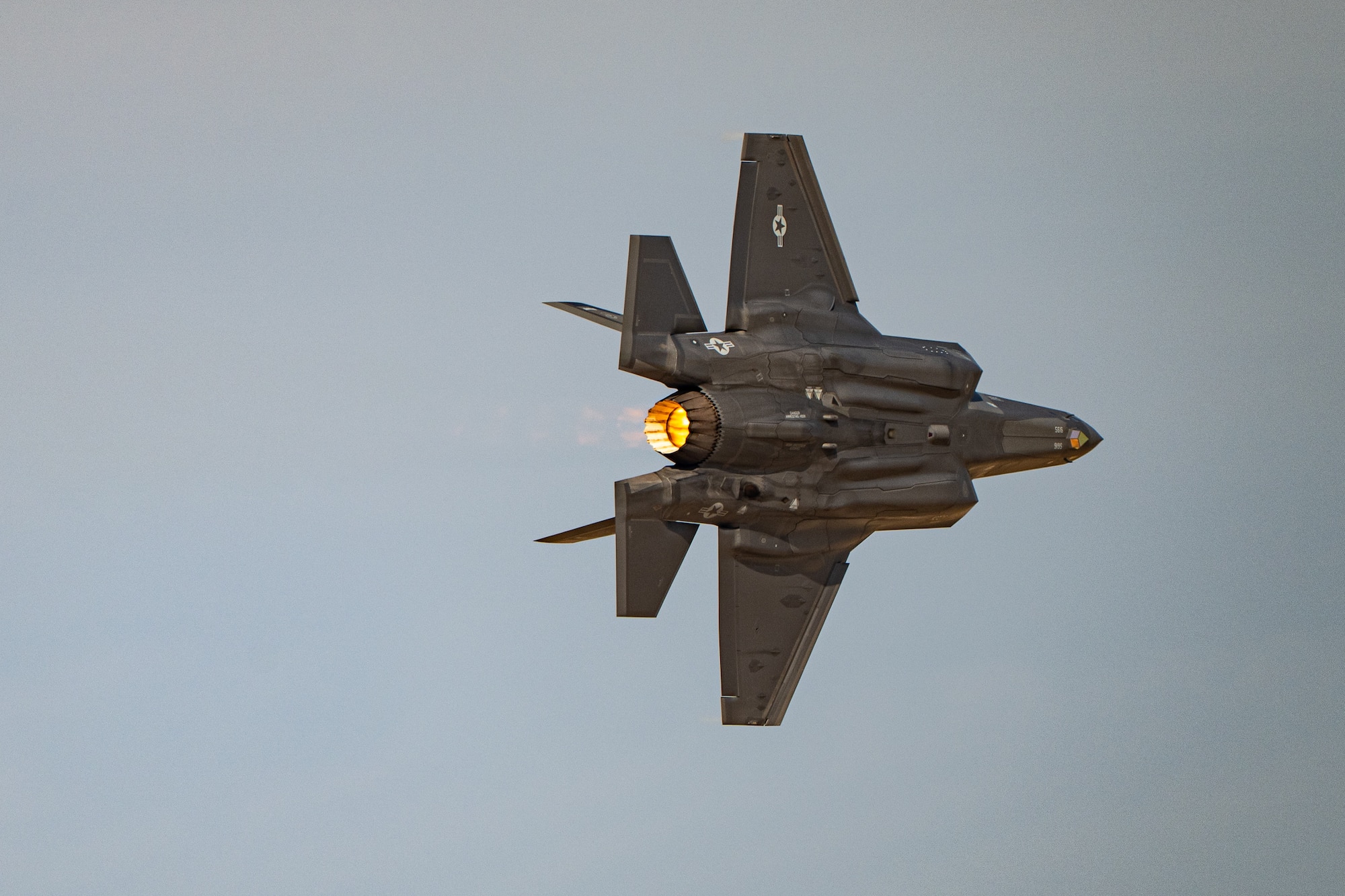 A U.S. Air Force F-35A Lightning II aircraft flown by the F-35 aerial demonstration team assigned to the 388th Fighter Wing at Hill Air Force Base, Utah, performs aerial maneuvers Nov. 15, 2025, over Al Maktoum International Airport in Dubai, United Arab Emirates. The fifth-generation stealth fighter rehearsed its performance prior to the Dubai Airshow 2025. (U.S. Air Force photo by Tech. Sgt. Justin Norton)