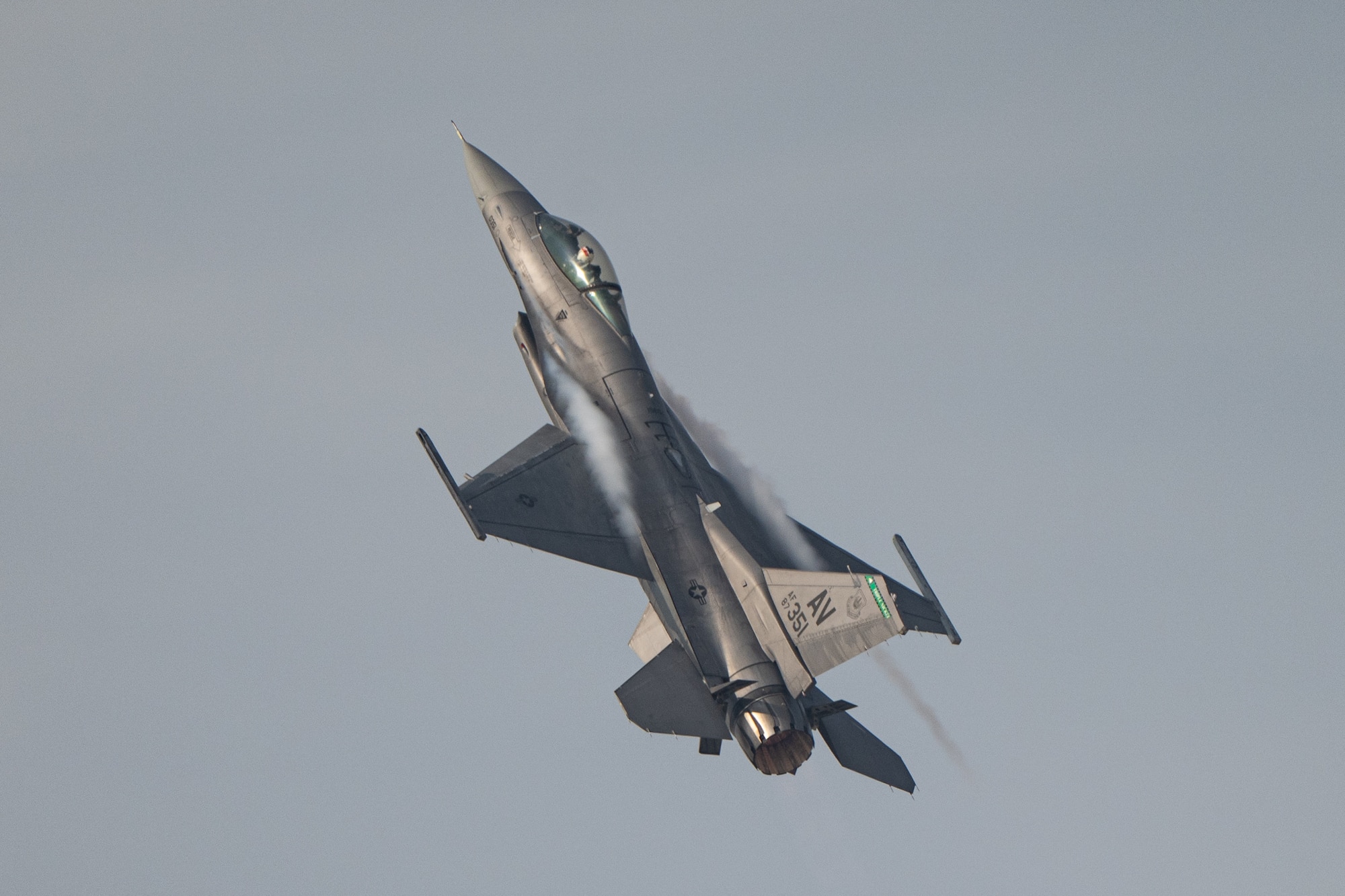 A U.S. Air Force F-16C Fighting Falcon assigned to the 555th Fighter Squadron at Aviano Air Base, Italy, performs aerial maneuvers Nov. 15, 2025, over Al Maktoum International Airport in Dubai, United Arab Emirates. The multi-role fighter aircraft rehearsed its performance prior to the Dubai Airshow 2025. (U.S. Air Force photo by Tech. Sgt. Justin Norton)