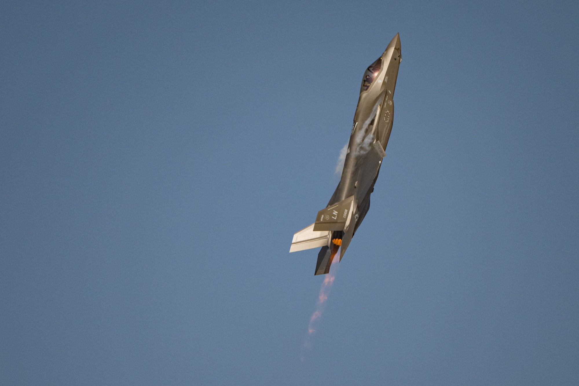 A U.S. Air Force F-35A Lightning II aircraft flown by the F-35 aerial demonstration team assigned to the 388th Fighter Wing at Hill Air Force Base, Utah, performs aerial maneuvers Nov. 15, 2025, over Al Maktoum International Airport in Dubai, United Arab Emirates. The fifth-generation stealth fighter rehearsed its performance prior to the Dubai Airshow 2025. (U.S. Air Force photo by Tech. Sgt. Justin Norton)