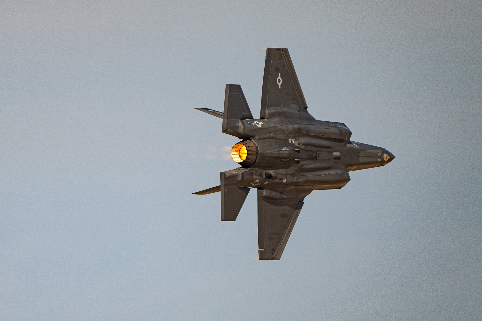 A U.S. Air Force F-35A Lightning II aircraft flown by the F-35 aerial demonstration team assigned to the 388th Fighter Wing at Hill Air Force Base, Utah, performs aerial maneuvers Nov. 15, 2025, over Al Maktoum International Airport in Dubai, United Arab Emirates. The fifth-generation stealth fighter rehearsed its performance prior to the Dubai Airshow 2025. (U.S. Air Force photo by Tech. Sgt. Justin Norton)