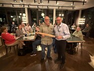 The 405th Army Field Support Brigade hosted a farewell dinner for Herb Gately Nov. 17 in honor of his dedicated service and exceptional work supporting the brigade as a program analyst in the Contract Management Support Office since August 2024. Gately (pictured here on left) also served with the 405th AFSB’s Germany Battalion at the Coleman Army Prepositioned Stocks-2 worksite from March 2022 until August 2024 to include director of the APS-2 worksite for over a year. (U.S. Army courtesy photo)